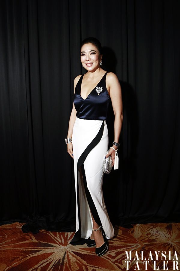 Lim Wei-Ling in Galvan dress, Chanel necklace and Piaget clutch