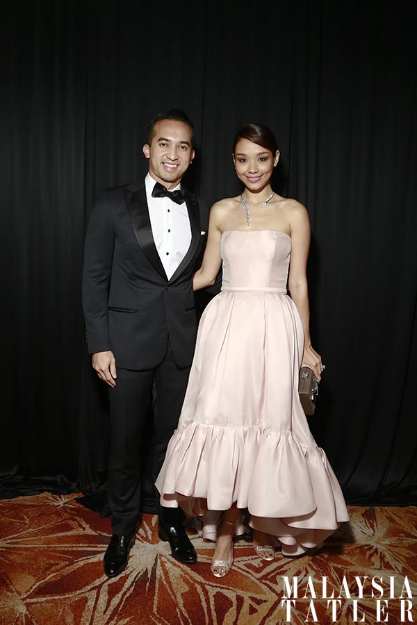 Nasarudin Nasimuddin and Marion Caunter in Reem Acra and Chanel accessories