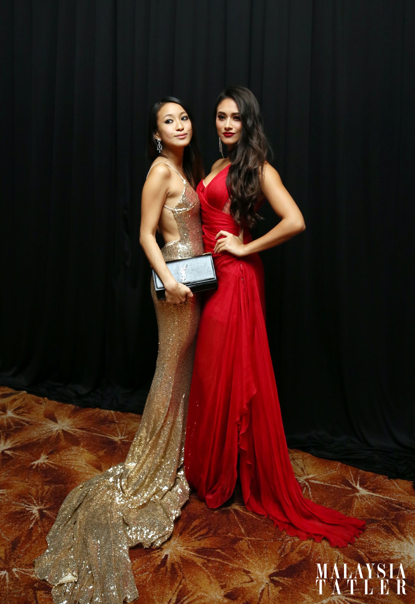 Rebekah Yeoh in Pronovias dress and YSL clutch, and Tunku Elana Khyra in Khoon Hooi