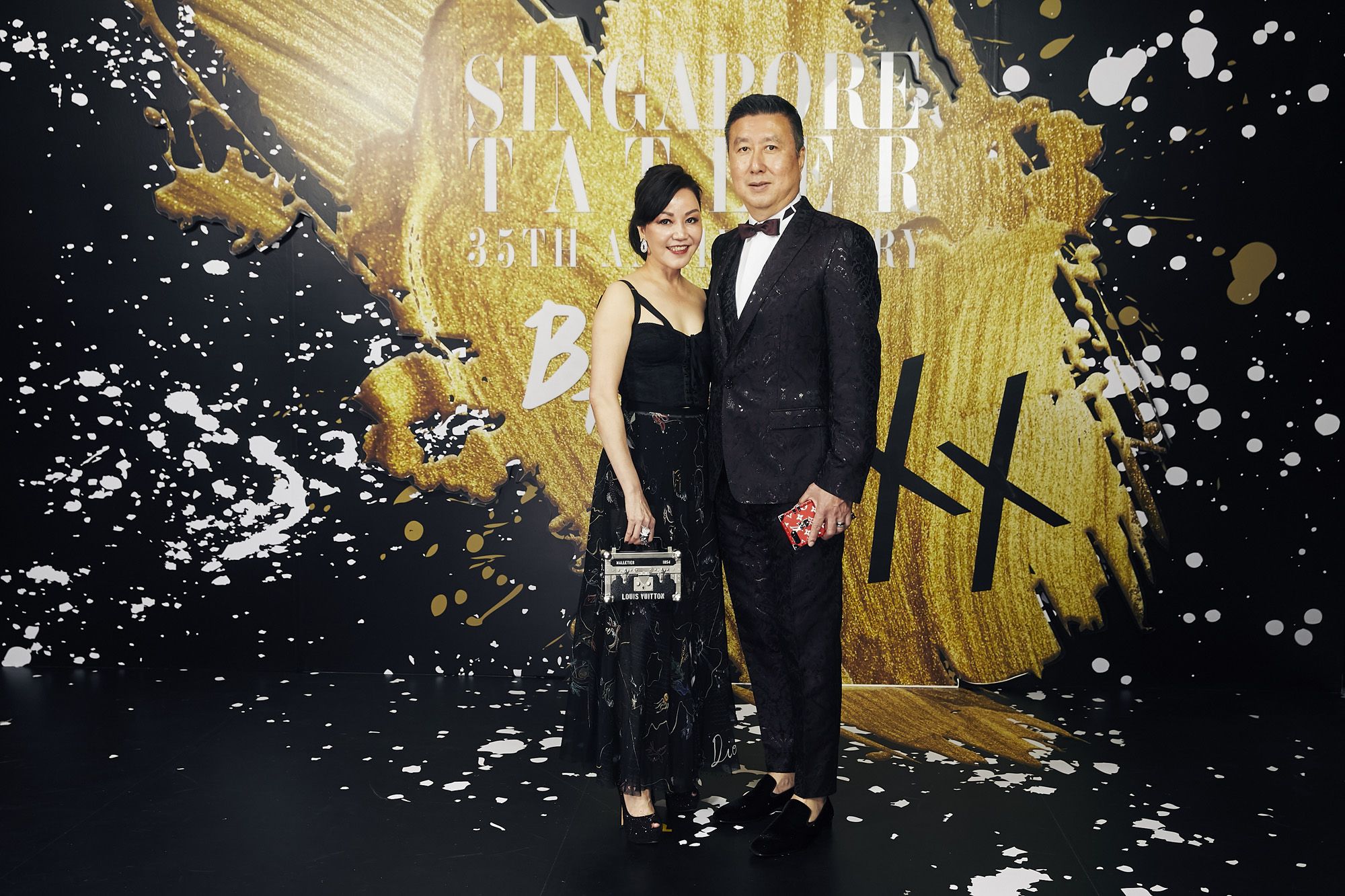 Emily Piak in Dolce & Gabbana and Dior, and Jeffrey Piak Dolce & Gabbana