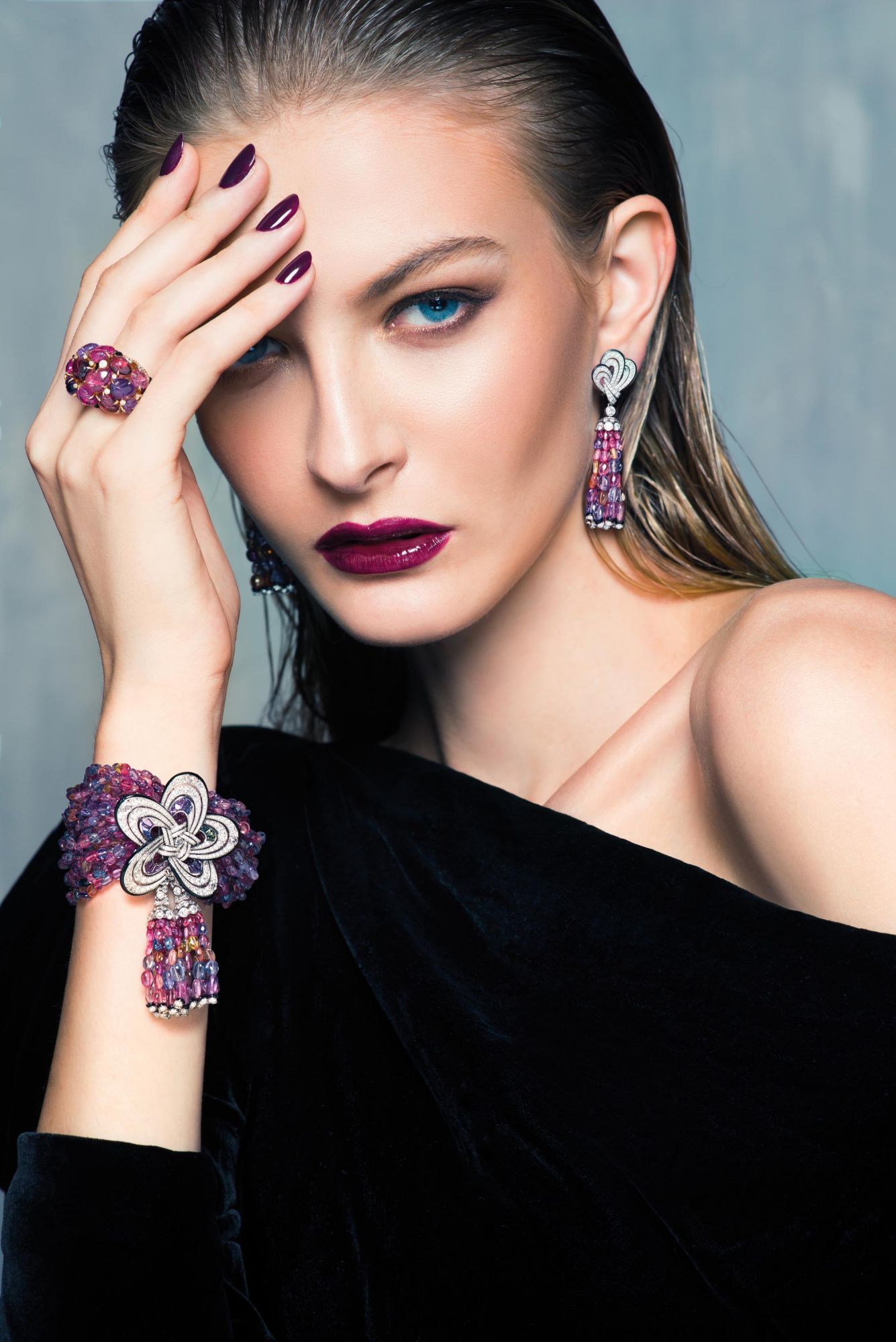 THINK PINK: Earrings, ring and bracelet in white gold set with multi-coloured sapphires, onyx and diamonds by Cartier; dress by Tom Ford