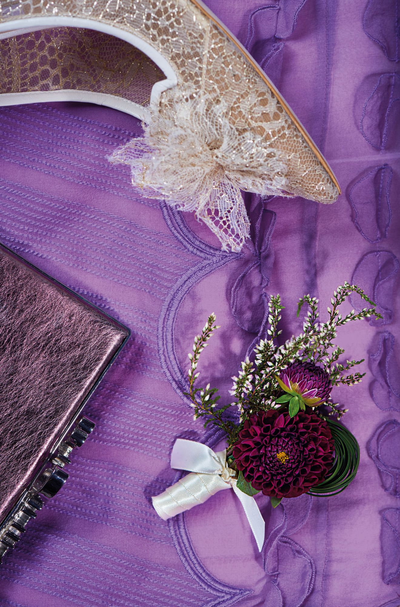Boutonnière of dahlias and erica by Armani/Fiori; dress by Chloé; shoes and clutch by Jimmy Choo