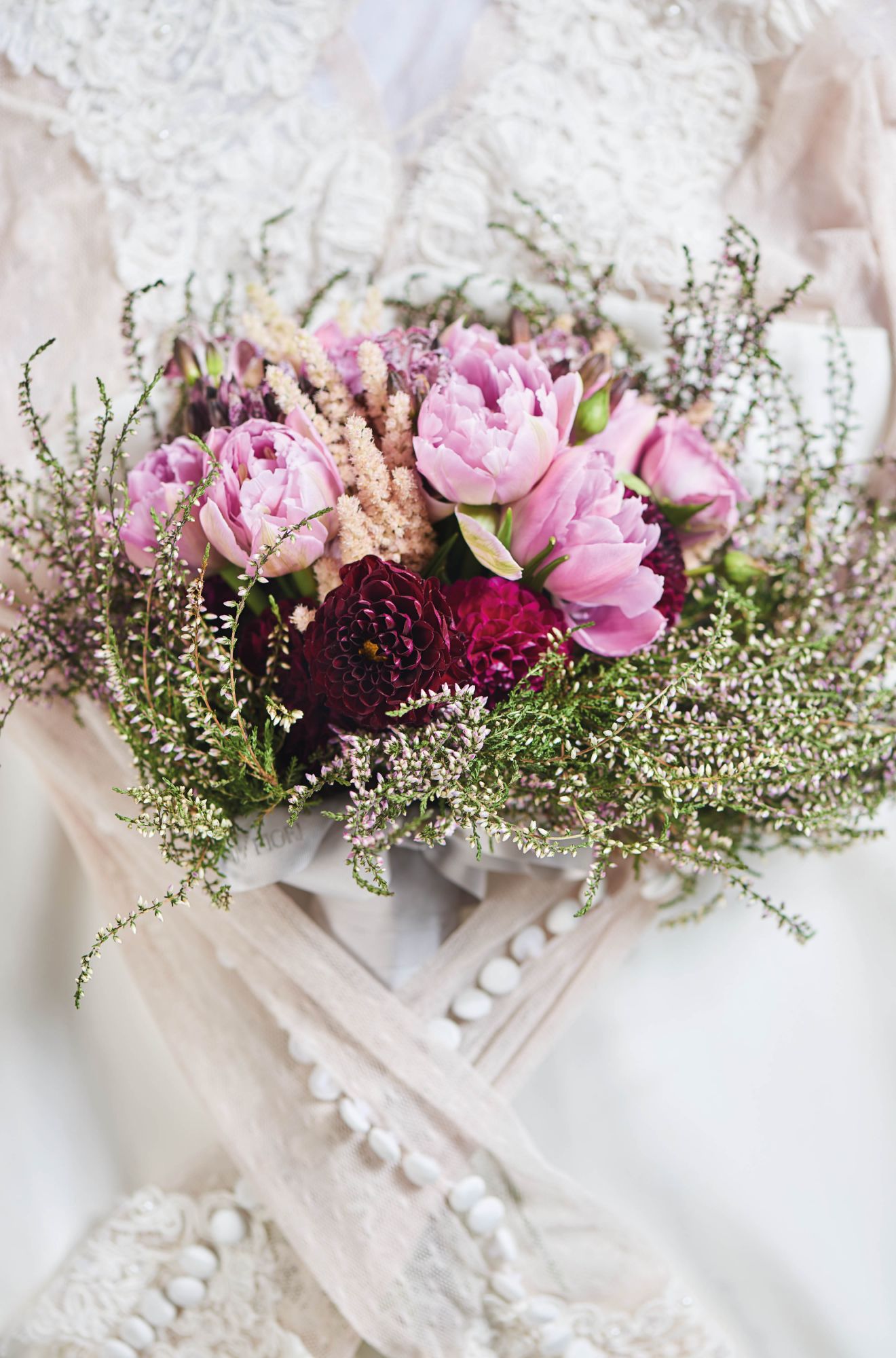 Bouquet of Dutch tulips and dahlias by Armani/Fiori; dress by Rania Hatoum