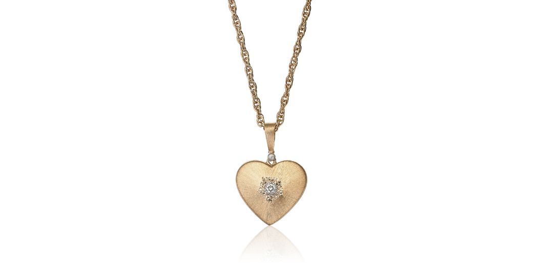 Bucellati "Macri Heart" pendant in gold set with diamonds