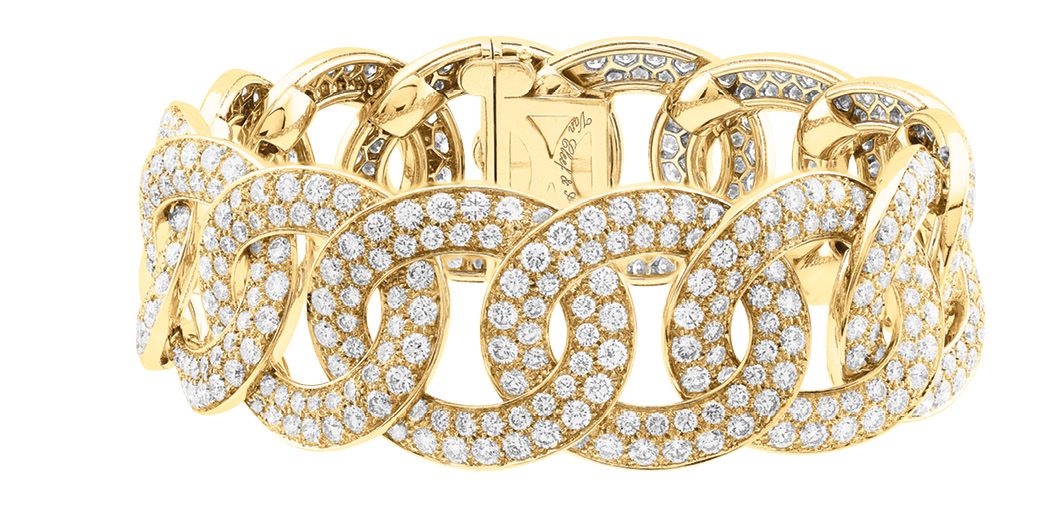 Olympia bracelet in yellow gold set with diamonds, by Van Cleef & Arpels