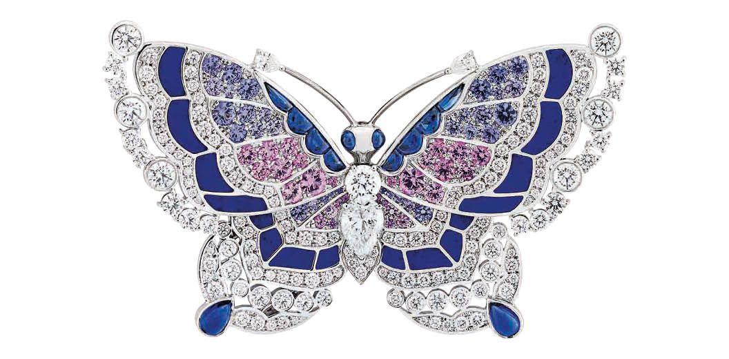 Van Cleef & Arpels butterfly clip in white gold set with diamonds, sapphires and lapiz lazuli