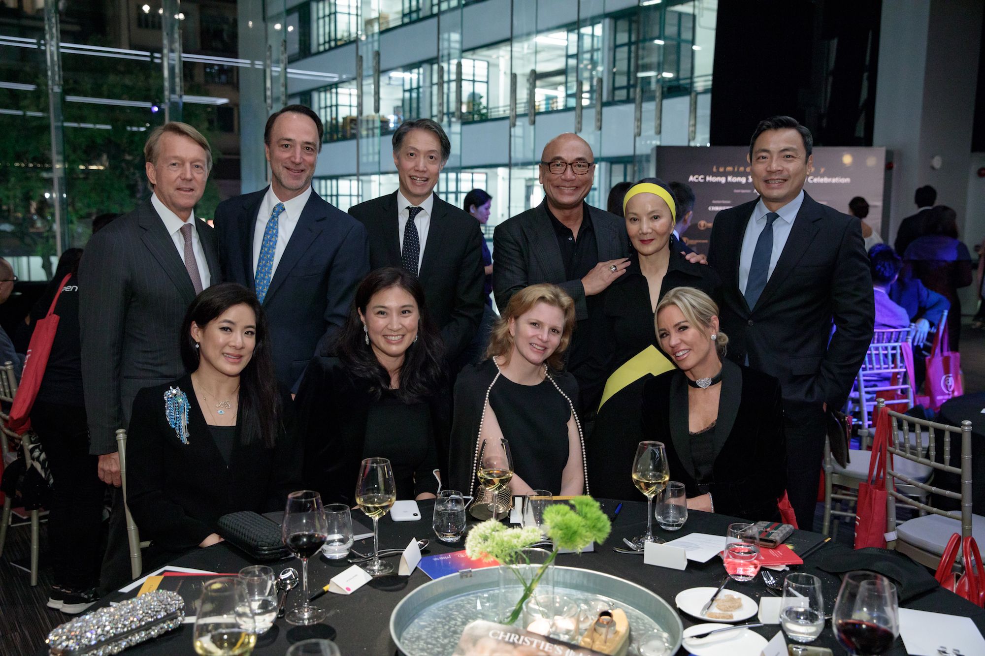 Standing - Ken Hitchner, Todd Marin, Stanley Chou, David Au, Reina Chau, Kevin Lam. Seated - Sabrina Fung-Lam, Leigh Tung-Chou, Fiona Kotur Marin, Annabelle Bond