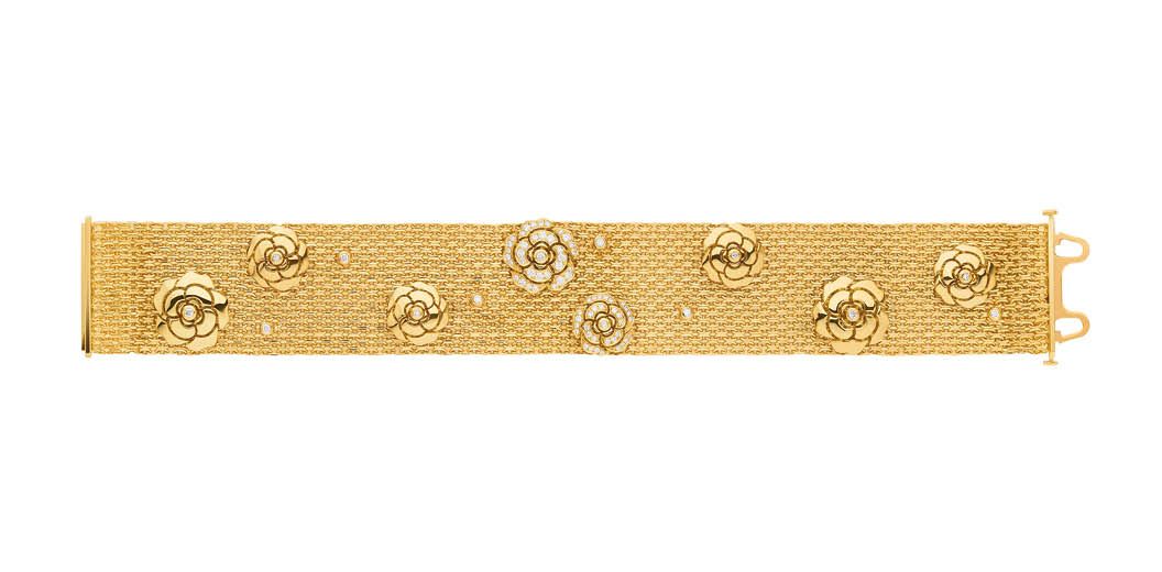 CHANEL Impression Camélia bracelet in gold set with diamonds. Available at Chanel Boutiques