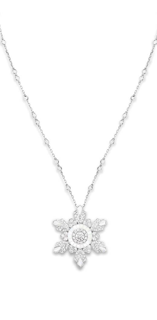 BOUCHERON Flocon long necklace in white gold set with diamonds and mother-of-pearl. Available at Boucheron