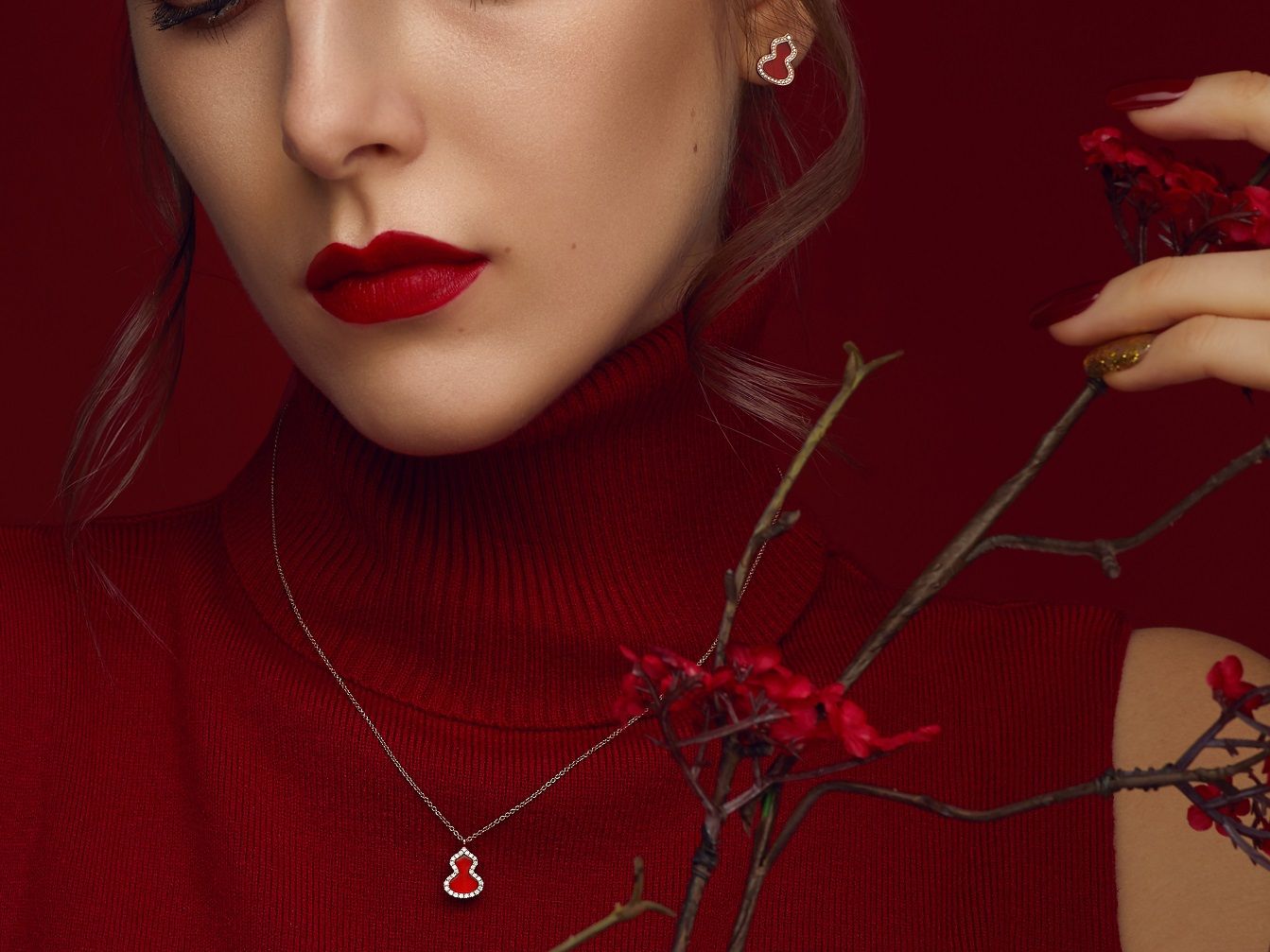 Qeelin Wulu Red Agate pendant and earrings in rose gold set with diamonds and red agate (Photo: Courtesy of Qeelin)