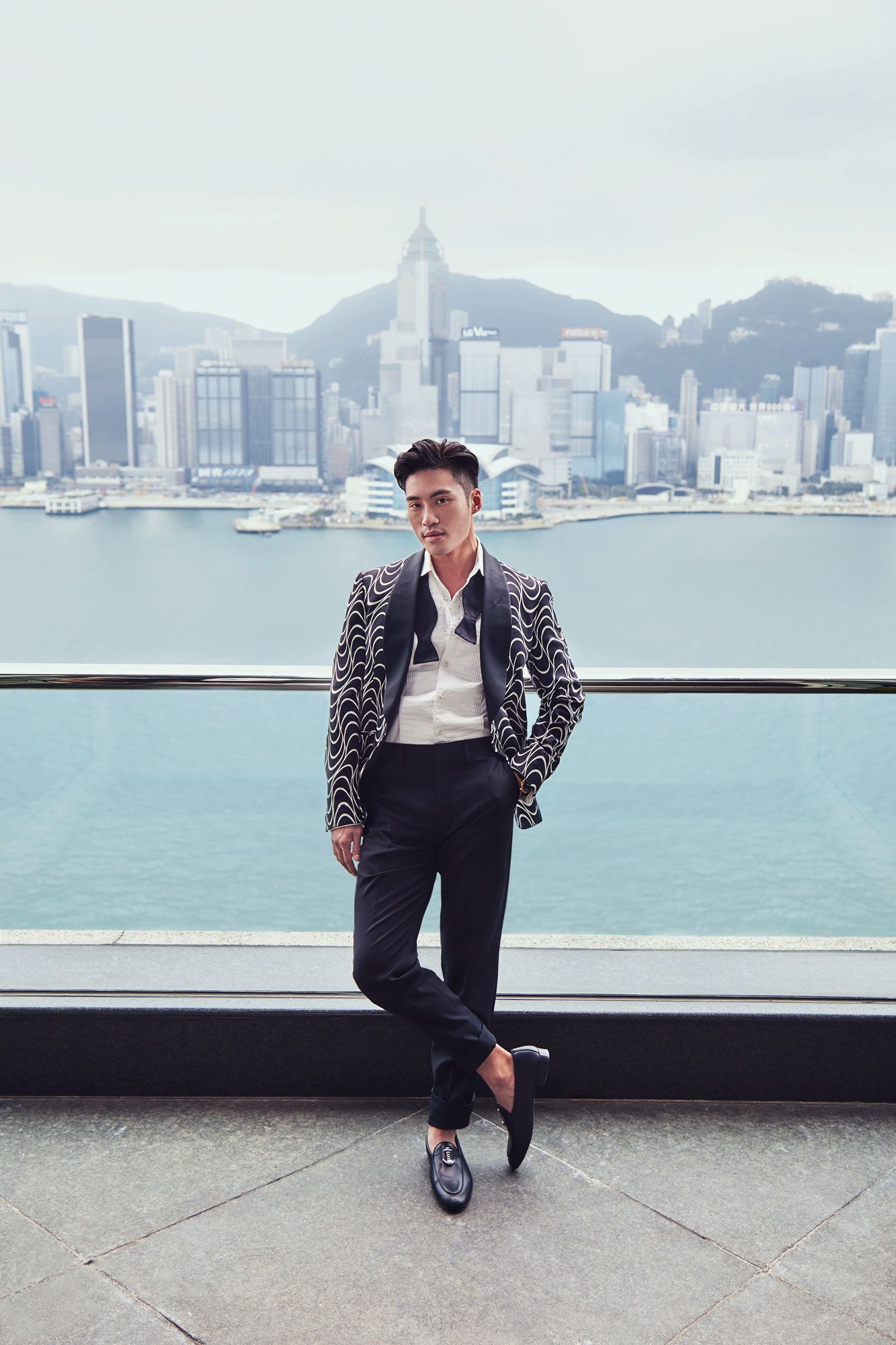 Loui wears a jacket, shirt, trousers, bow tie by Ralph Lauren Purple Label; shoes by Giuseppe Zanotti (Photography: Dino Busch/Hong Kong Tatler)