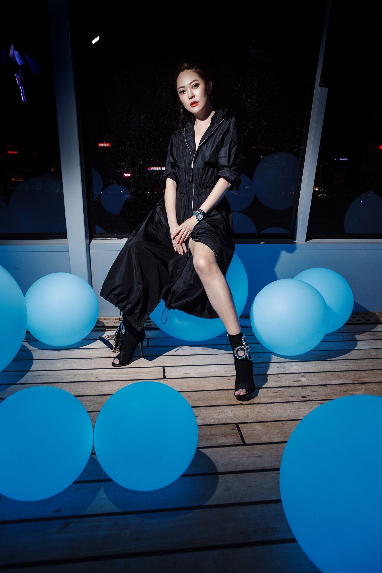 René Chu wears heels by Giuseppe Zanotti and a watch by Breguet