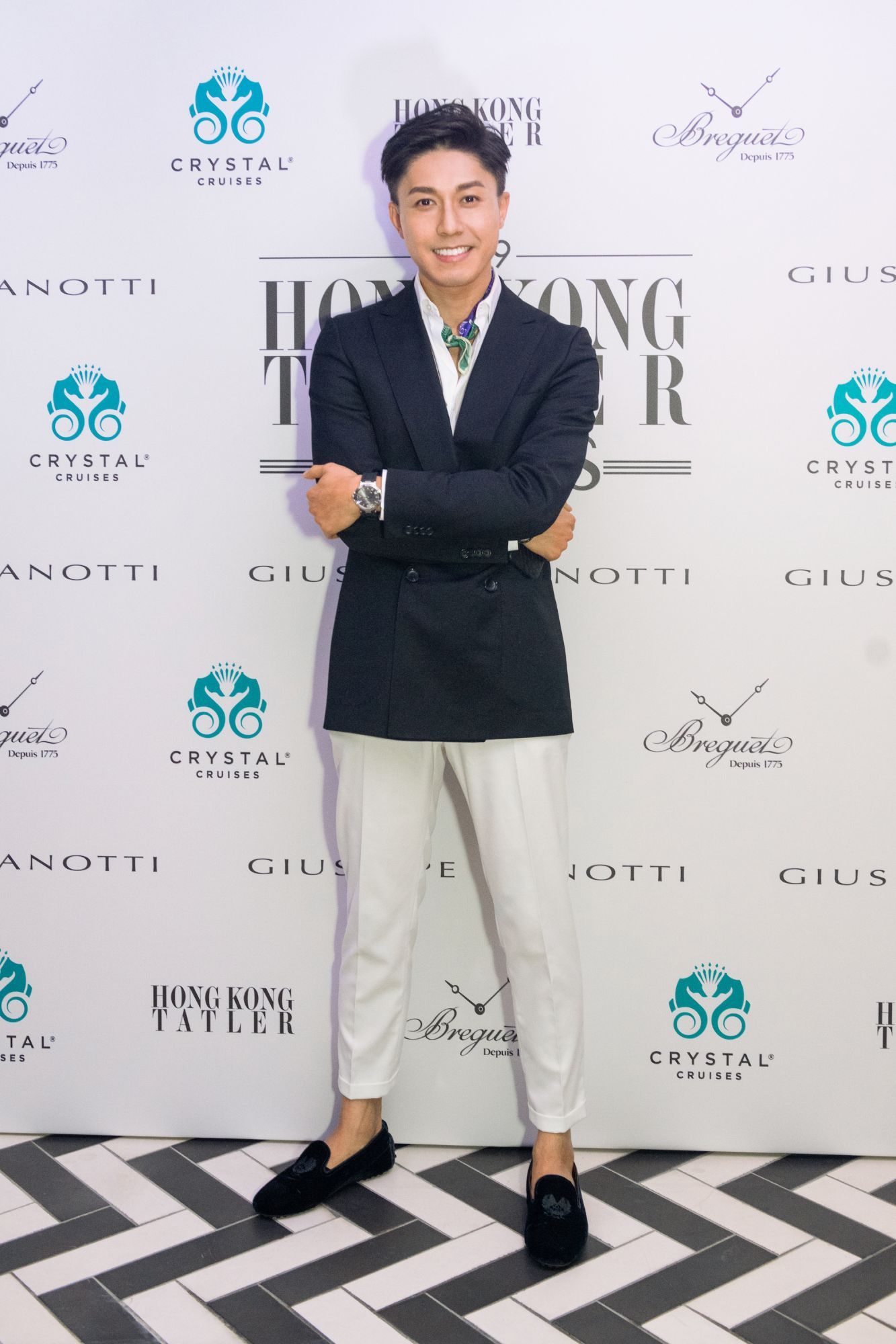 Edwin Pun wears a watch by Breguet