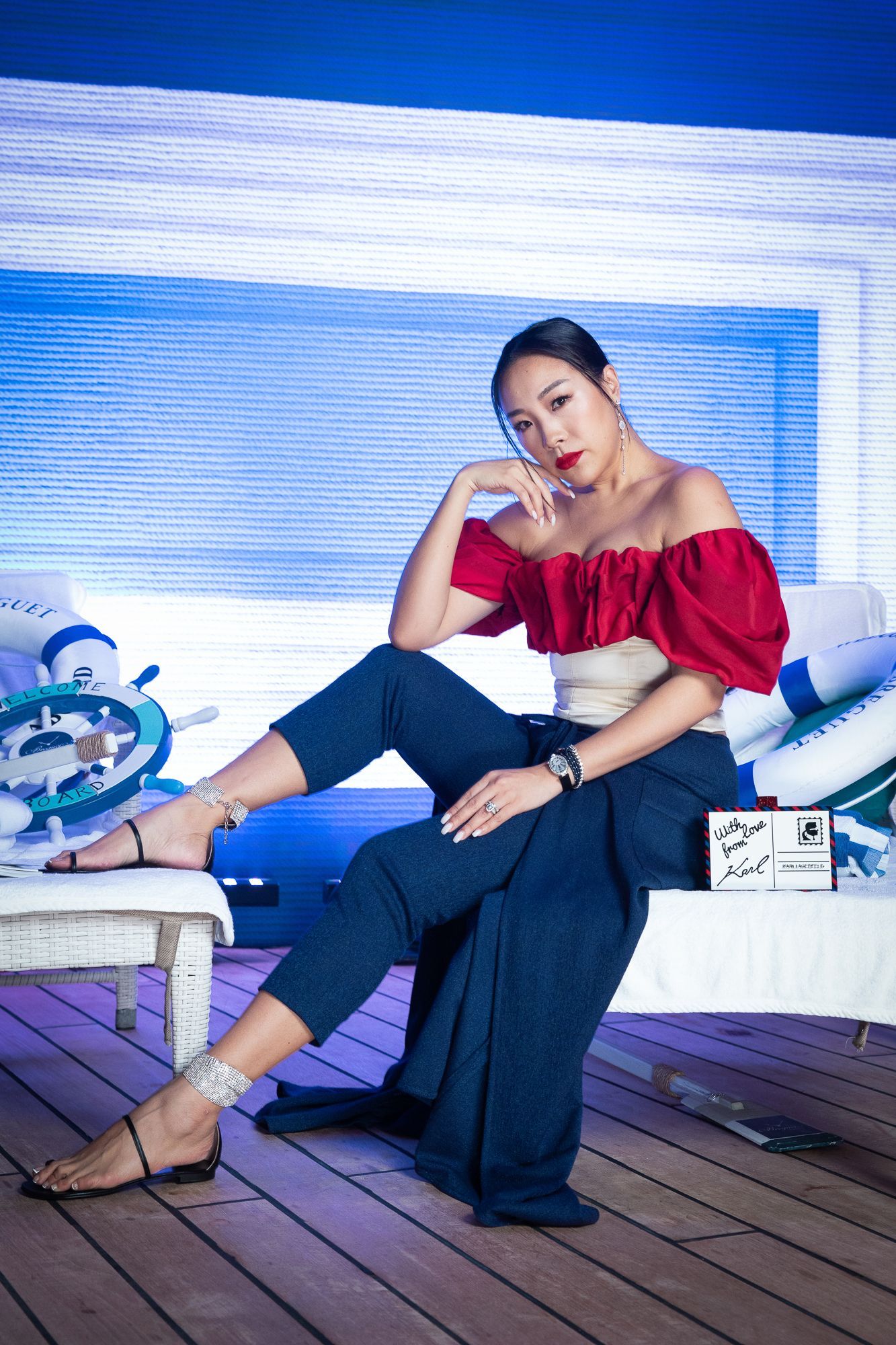 Feiping Chang wears heels by Giuseppe Zanotti and a watch by Breguet