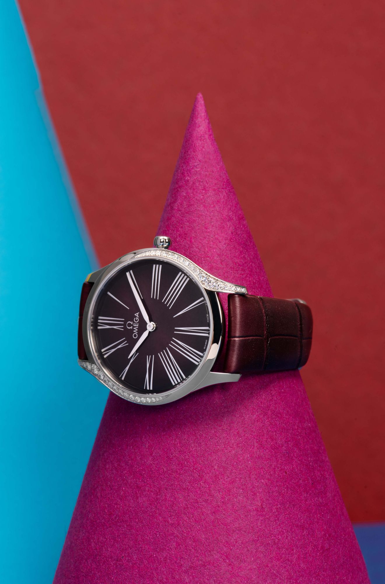 De Ville Trésor with a burgundy lacquered-gradient dial by Omega