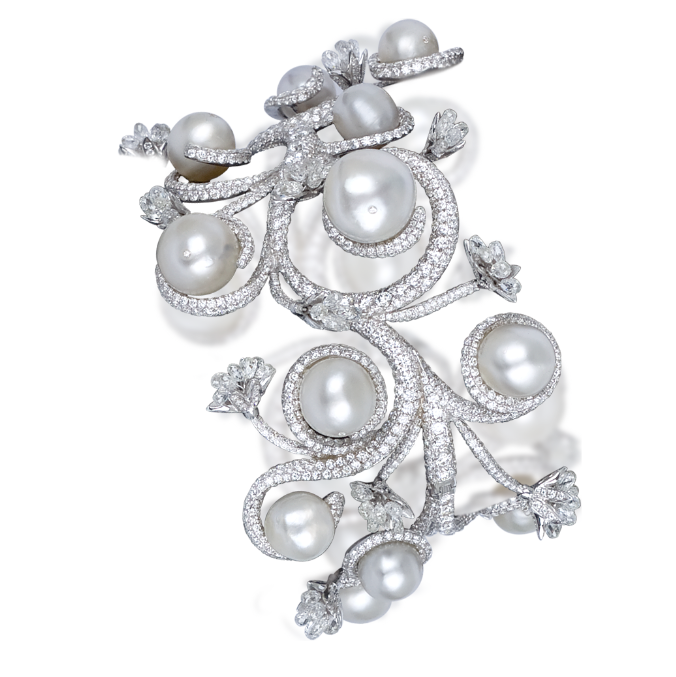 Bangle in white gold set with natural pearls and diamonds, by Moussaieff. (Photo: Courtesy of Moussaieff)