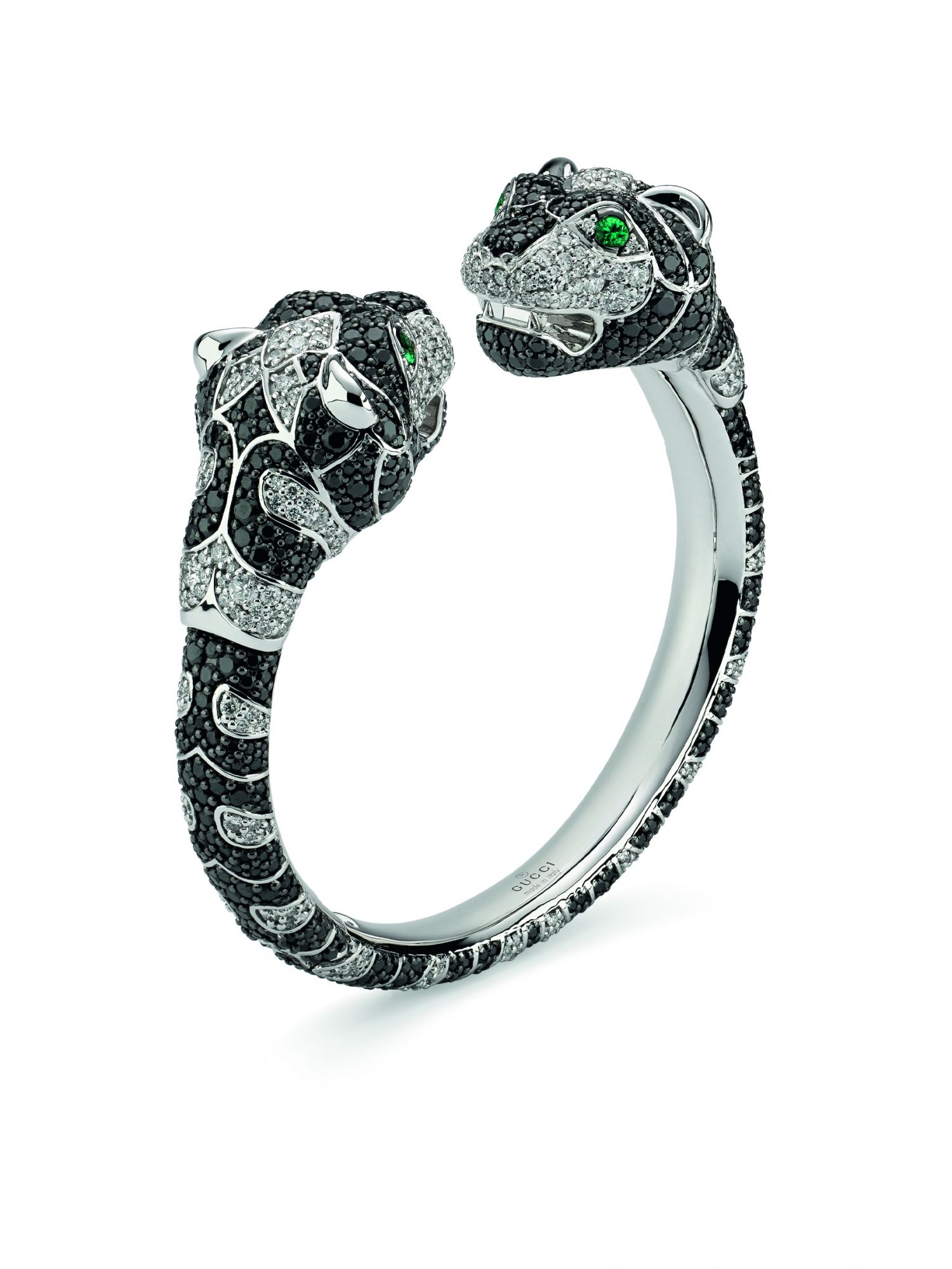 Tiger Head bracelet in white gold set with emeralds, and black and white diamonds, by Gucci
