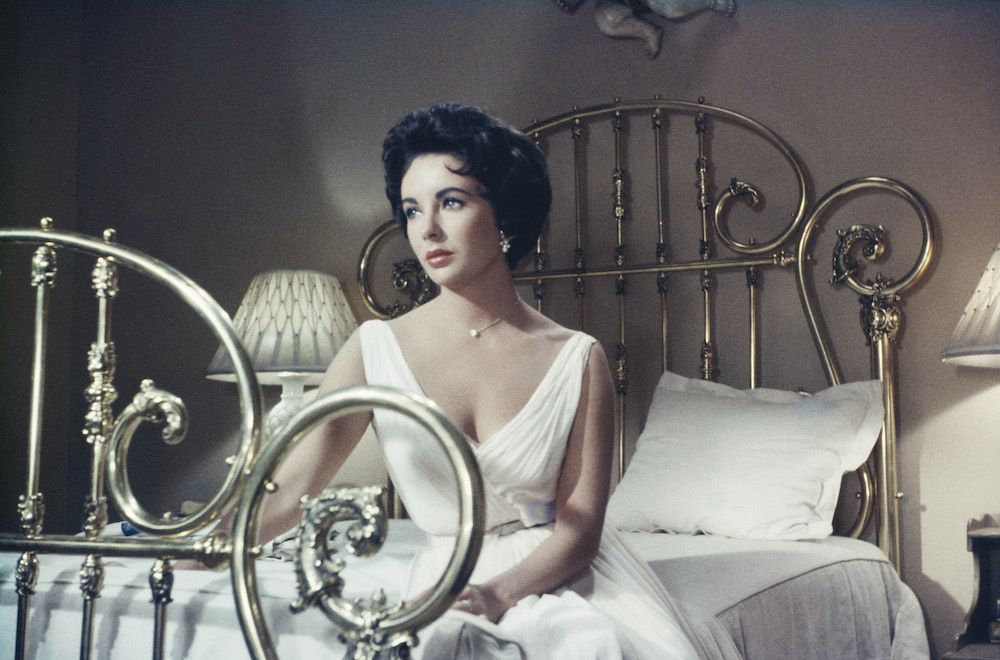 Elizabeth Taylor in the MGM film, 'Cat On A Hot Tin Roof', 1958 (Photo by Archive Photos/Getty Images)