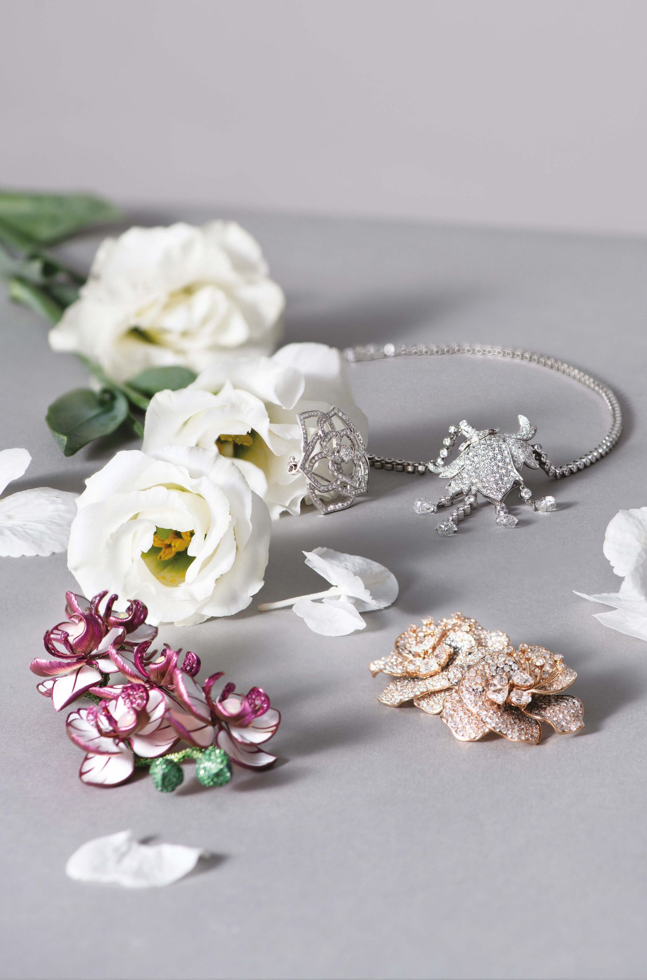 Clockwise, from top left: Rose brooch by Piaget; high jewellery necklace by Cartier; Immaculate earrings by Nuò by Cindy Yeung; high jewellery earring by Chopard