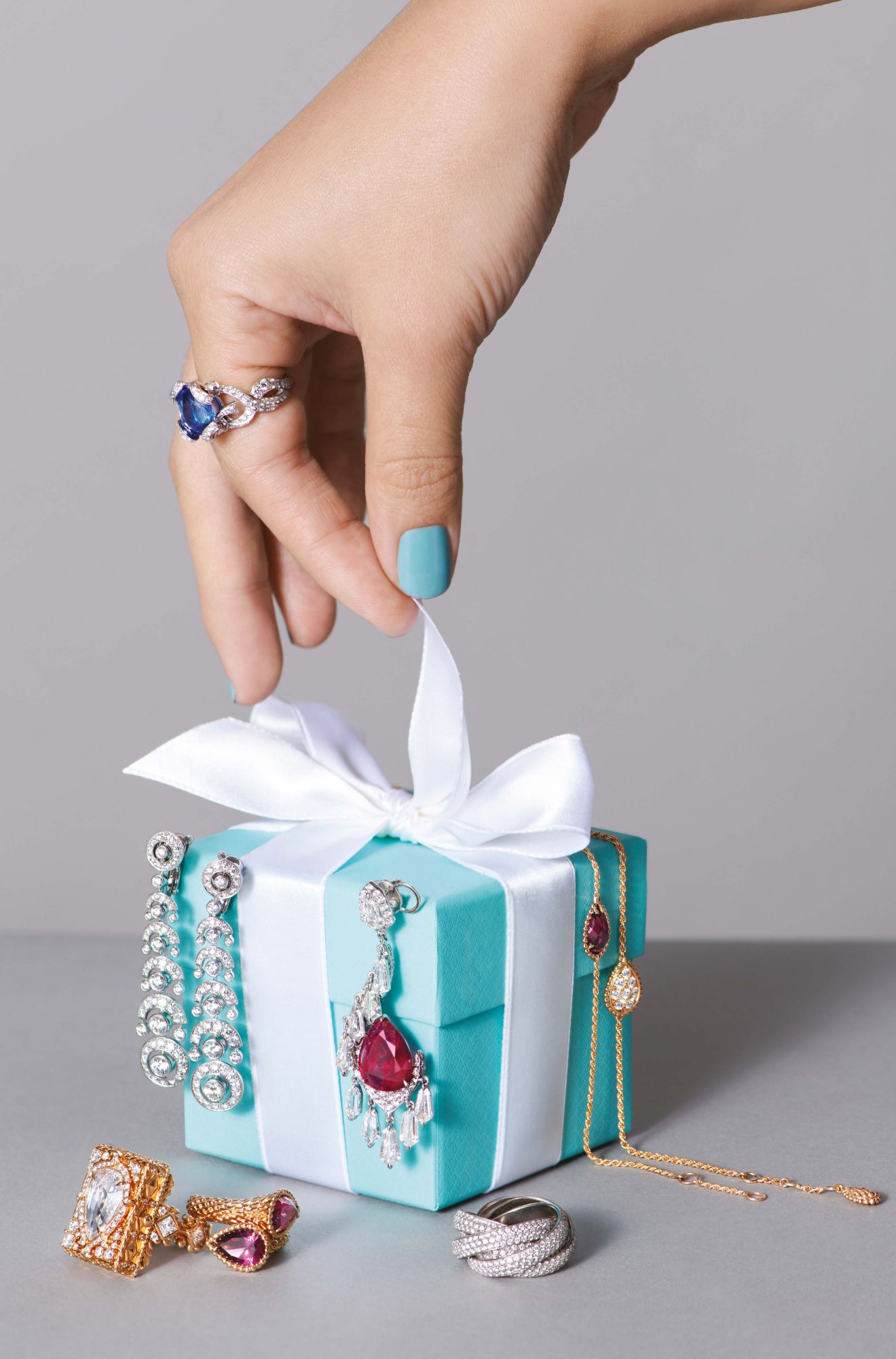 Clockwise, from top: Aveu ring by Dior Joaillerie; Serpent Bohème bracelets by Boucheron; Paloma’s Melody five-band ring by Tiffany & Co; Siam Pear-shaped Ruby and Diamond earring by Boghossian; Serpent Bohème ring by Boucheron; Dior à Versailles Pièces Secrètes ring by Dior Joaillerie; high jewellery earrings by Cartier