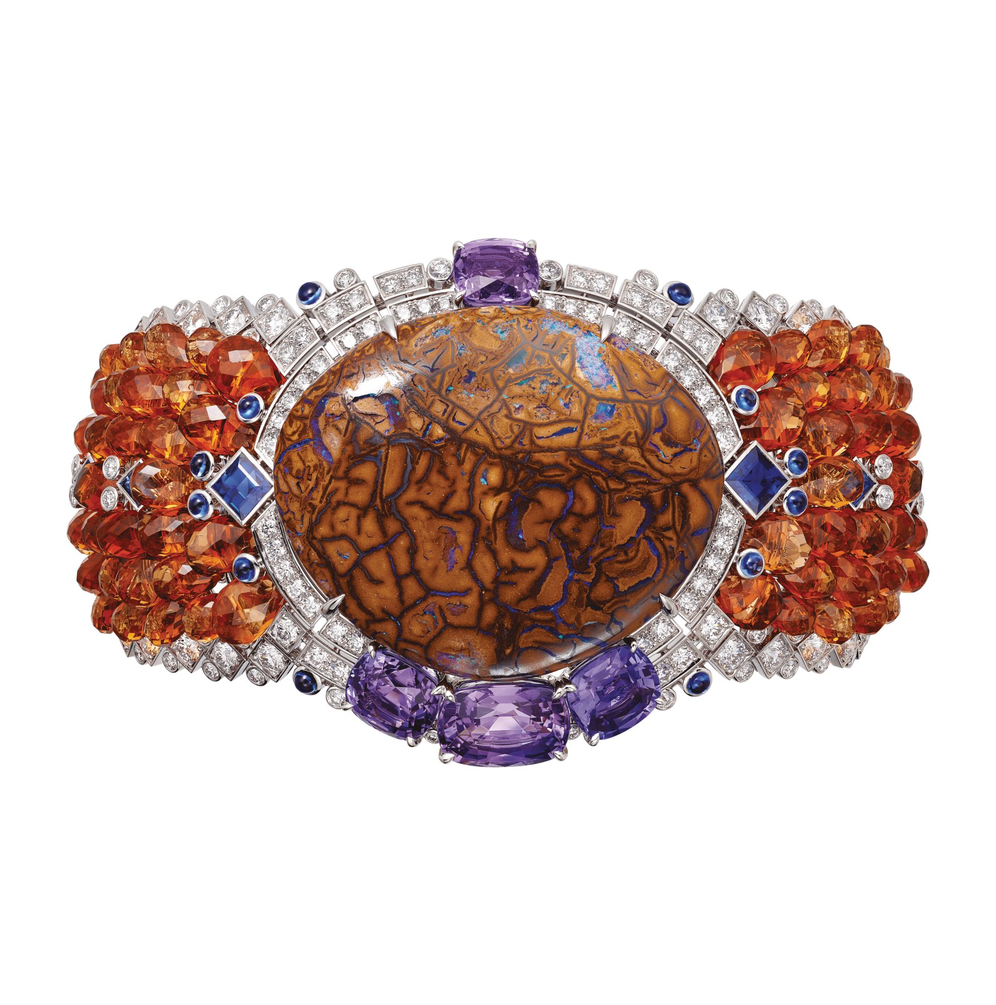 Zemia bracelet in white gold set with an opal, sapphires, spessartite garnets and diamonds by Cartier