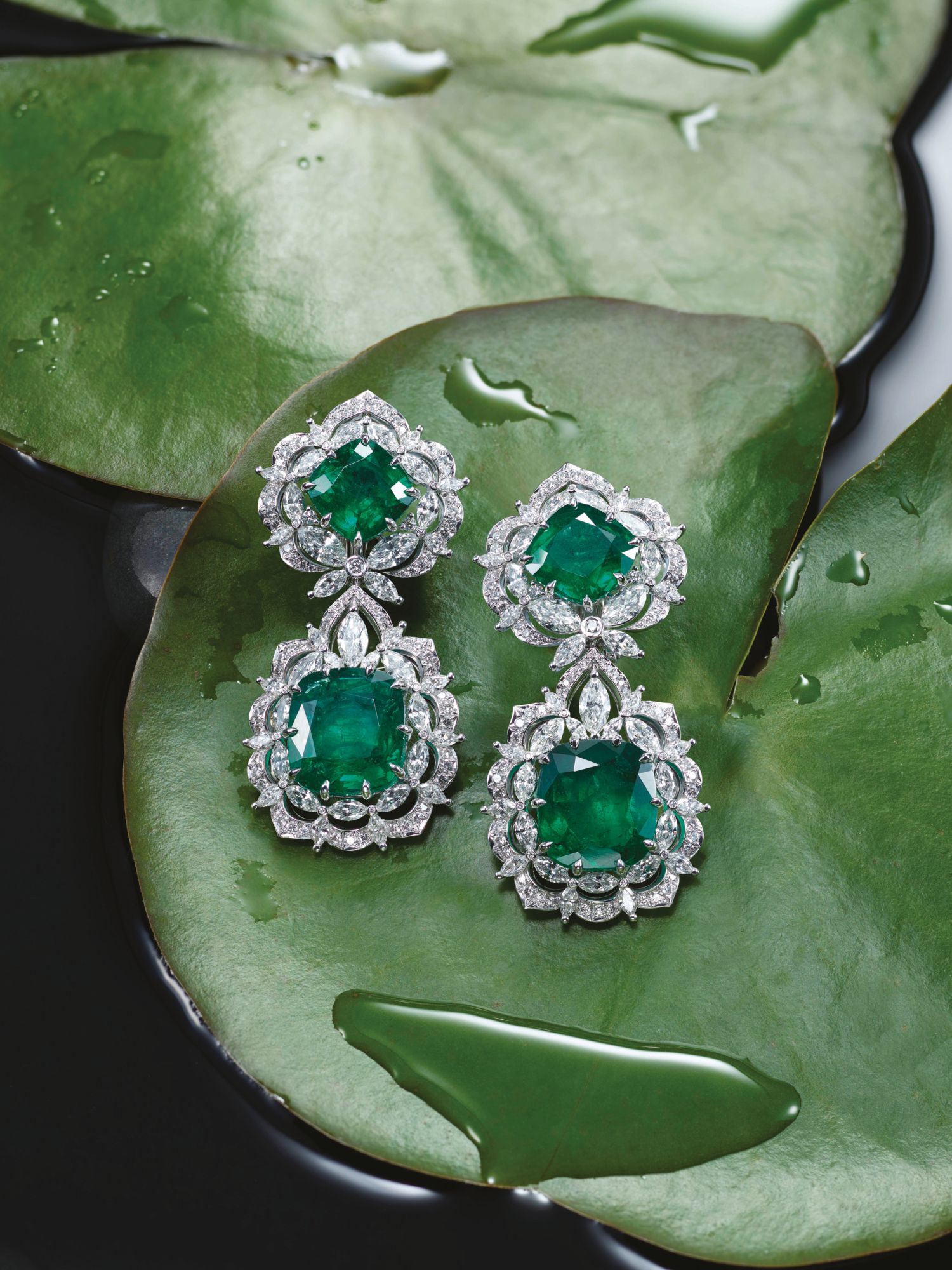Green Carpet earrings in white gold set with emeralds and diamonds by Chopard