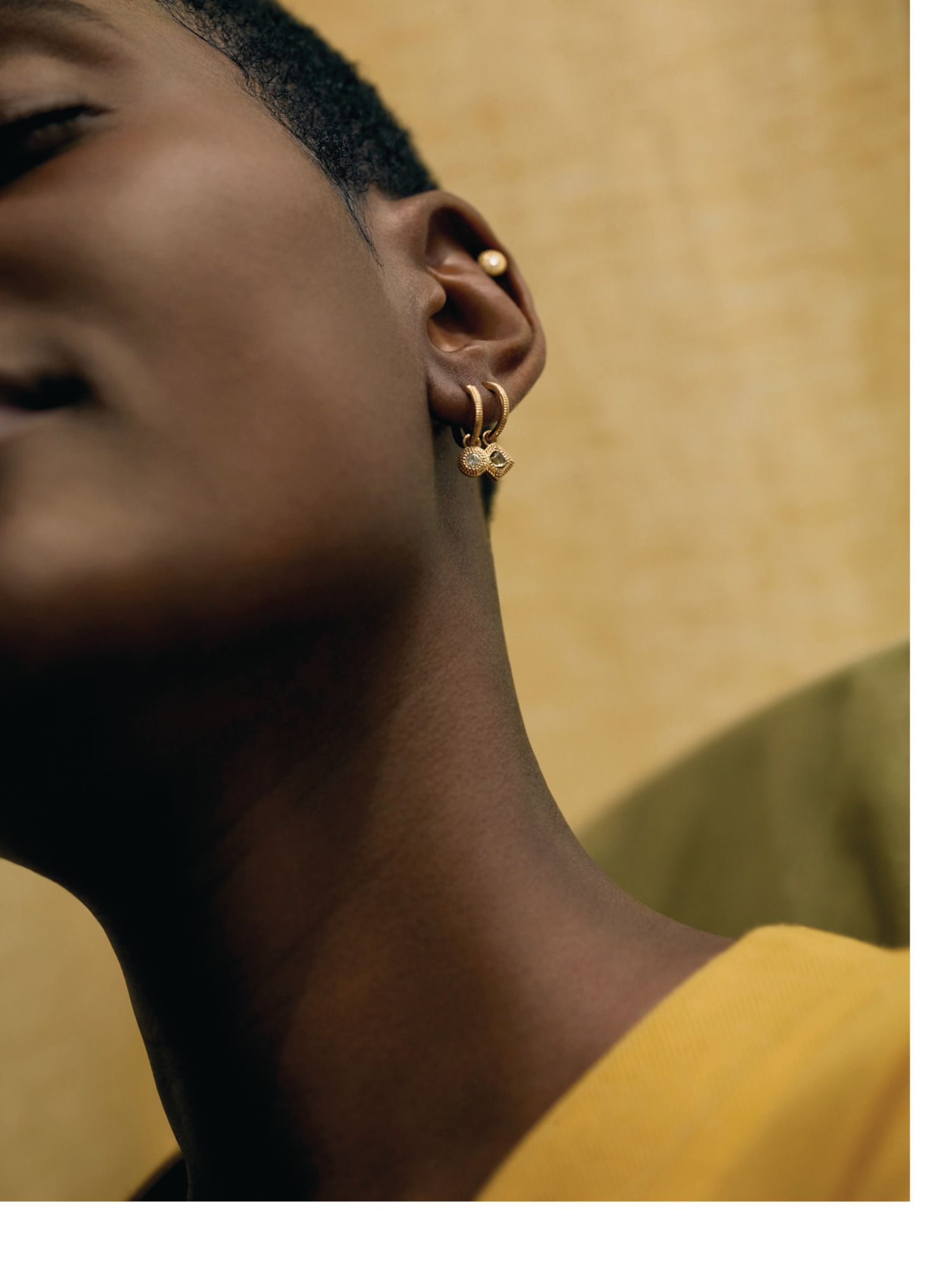 De Beers talisman earrings in yellow, rose and white gold set with diamonds.