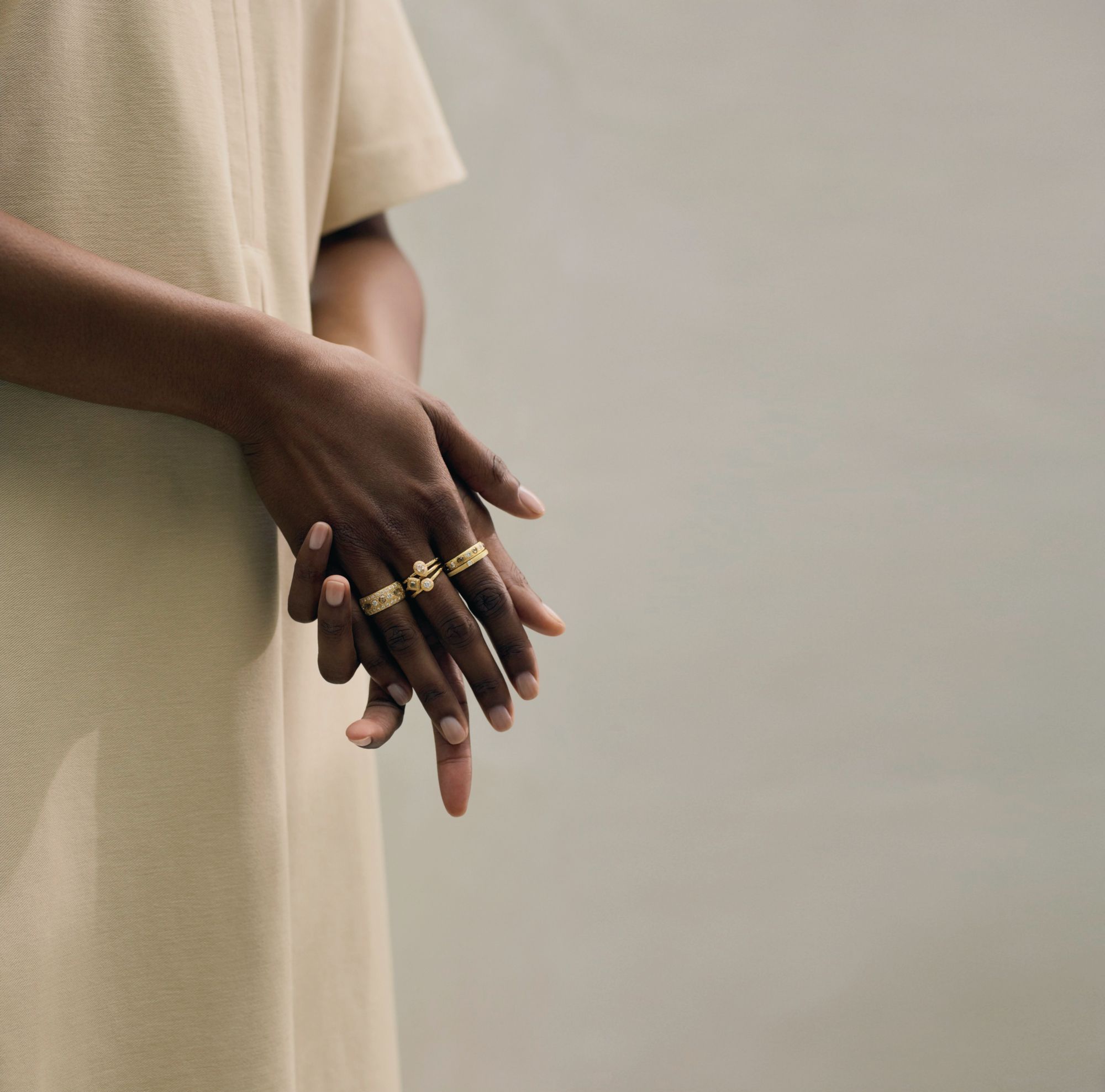 De Beers talisman rings in yellow, rose and white gold set with diamonds.
