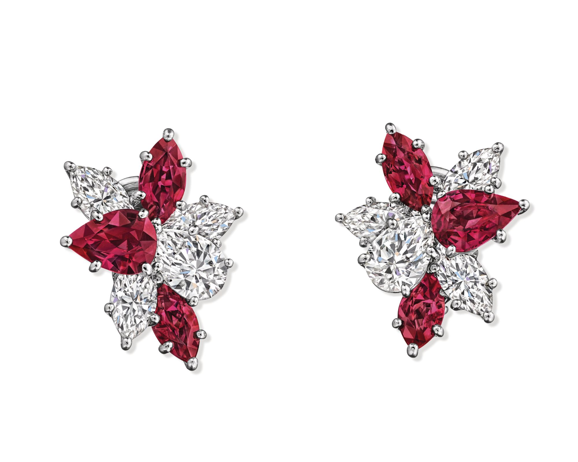 Harry Winston Winston Cluster earring in platinum set with rubies and diamonds.