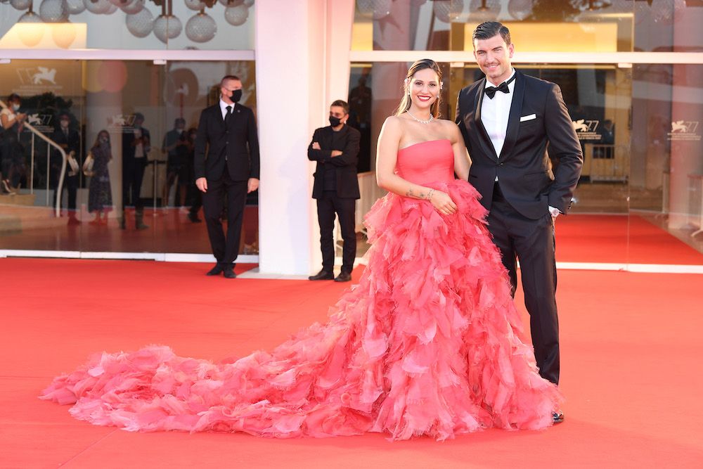 Beatrice Valli and Marco Fantini walk the red carpet ahead of the movie "Padrenostro" at the 77th Venice Film Festival (Photo by Daniele Venturelli/WireImage,)