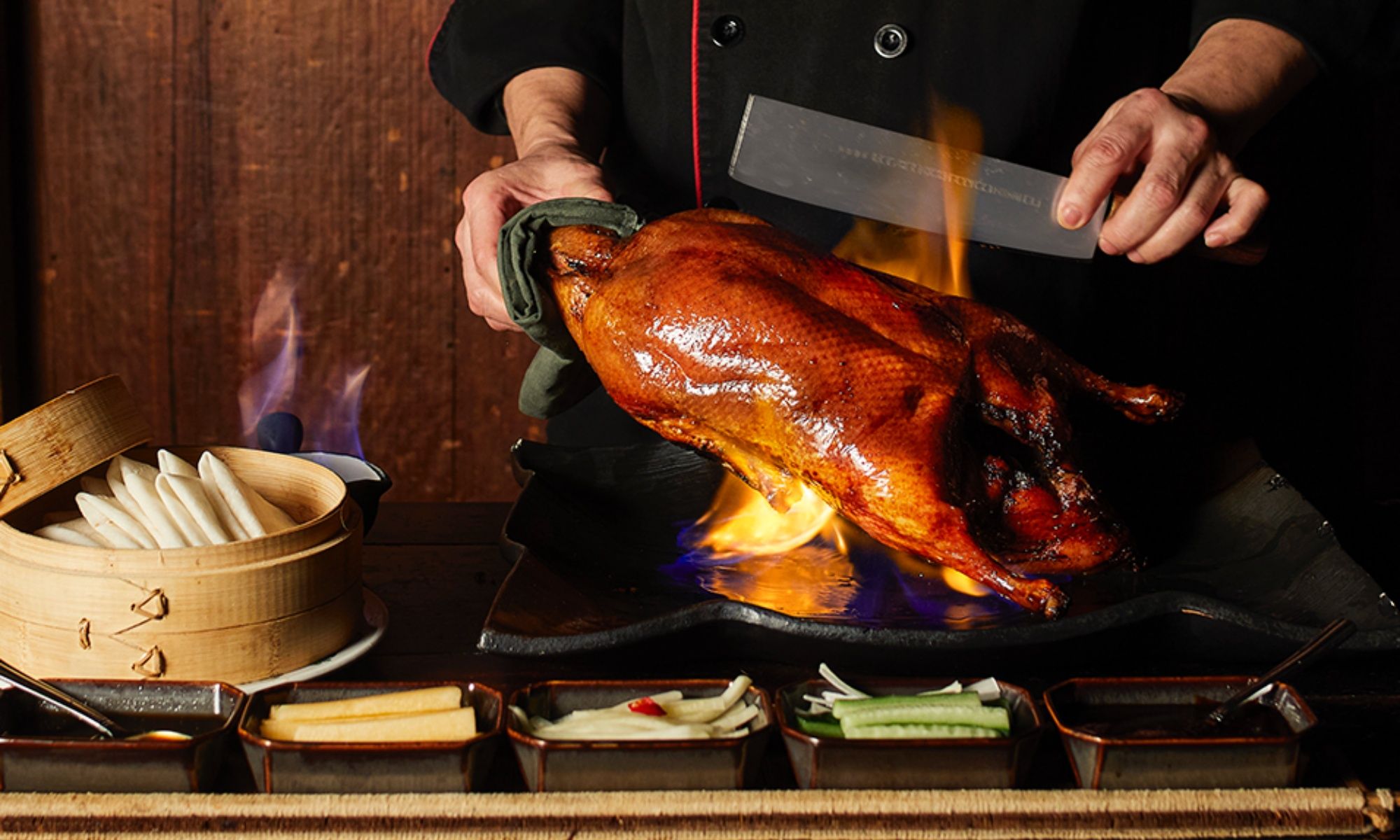 Tsim Sha Tsui's Hutong Launches New Flaming Peking Duck This November