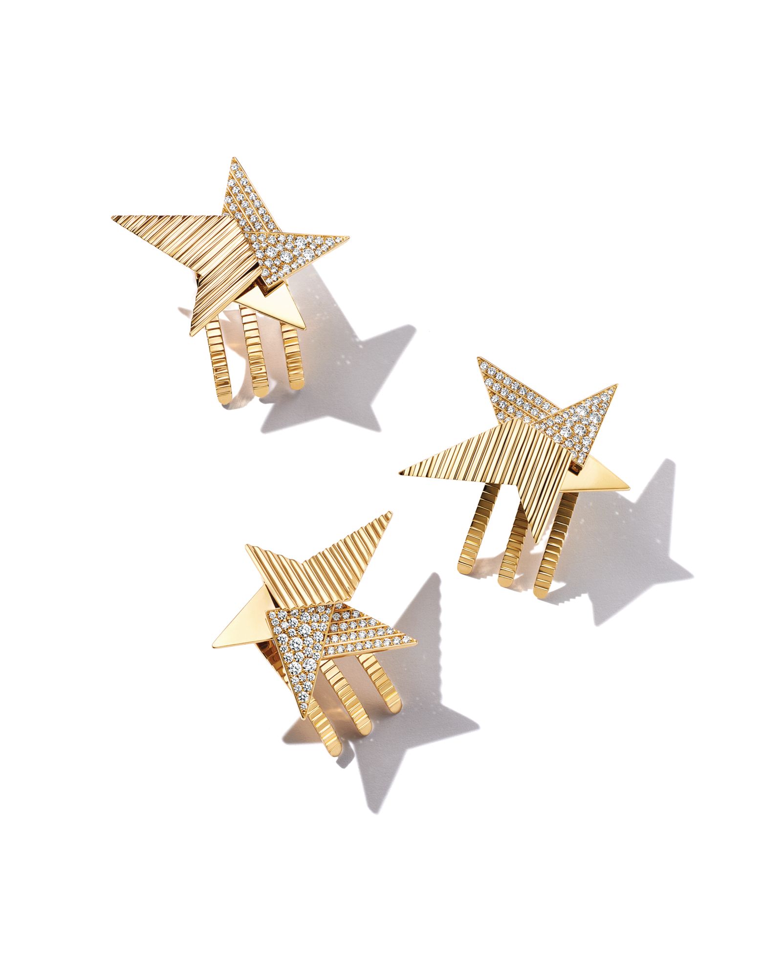 Hair clips in yellow gold set with diamonds by Tiffany & Co