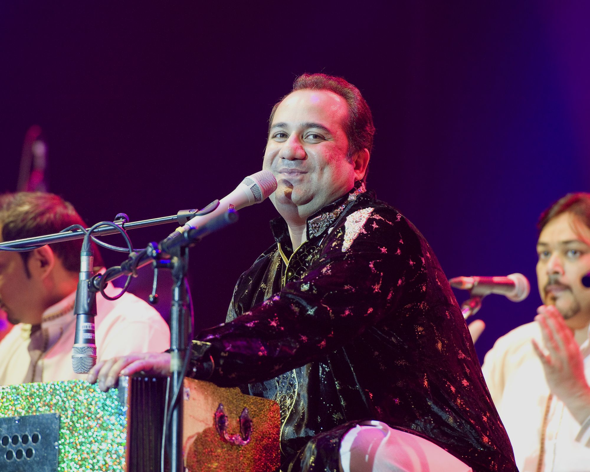 LONDON, UNITED KINGDOM - AUGUST 25: Rahat Fateh Ali Khan performs on stage at O2 Arena on August 25, 2013 in London, England. (Photo by Robin Little/Redferns via Getty Images)