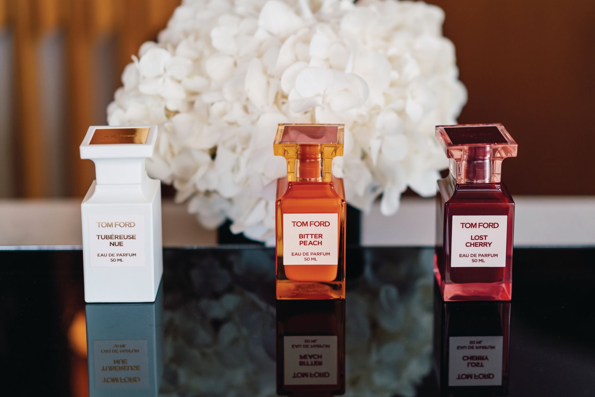 Tom Ford’s signature fragrances in tubéreuse nue, bitter peach and lost cherry