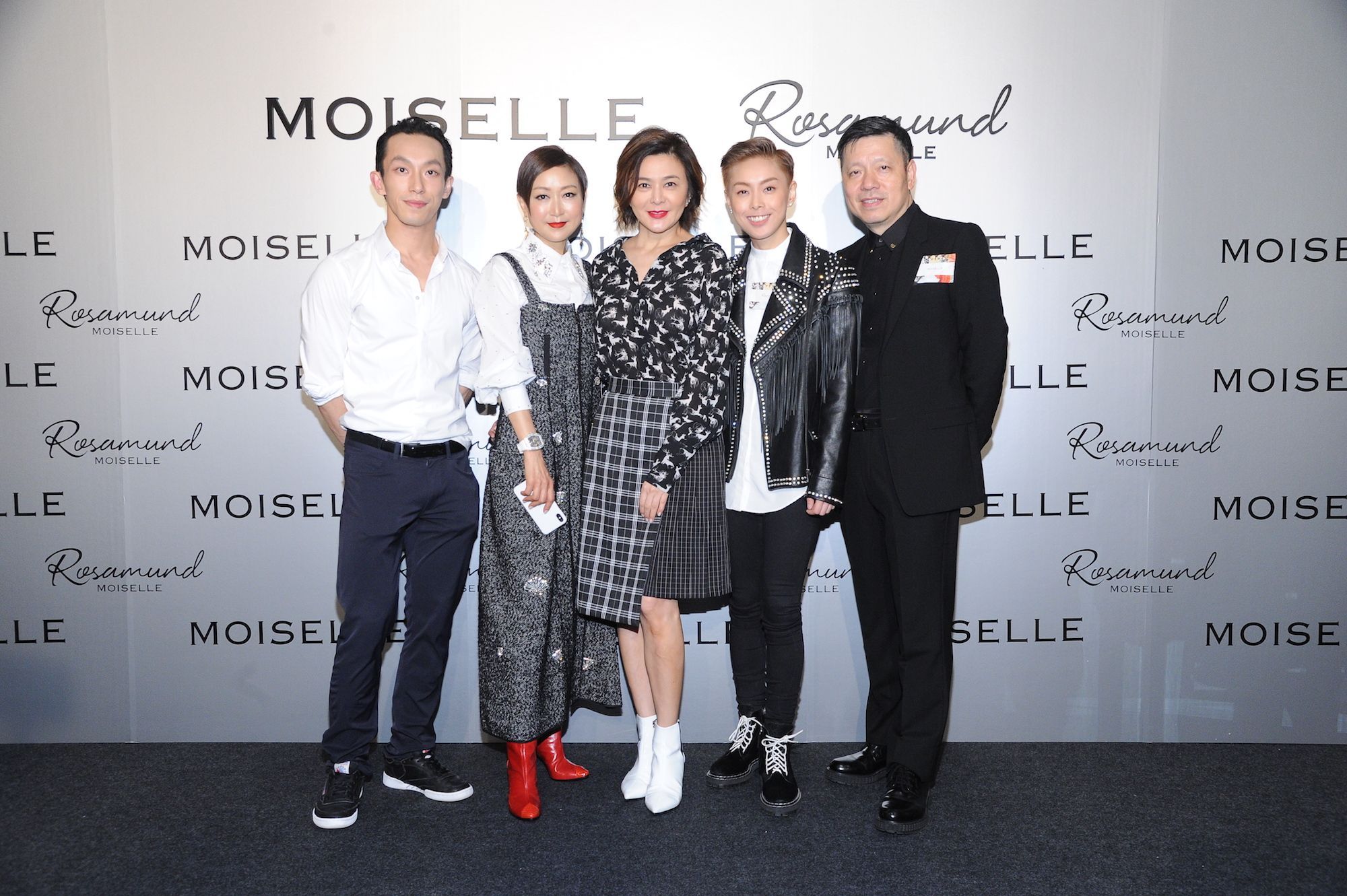 Harris Chan, far left, next to his mother Shirley Chan, who co-founded Moiselle in 1997 with Boby Chan, far right