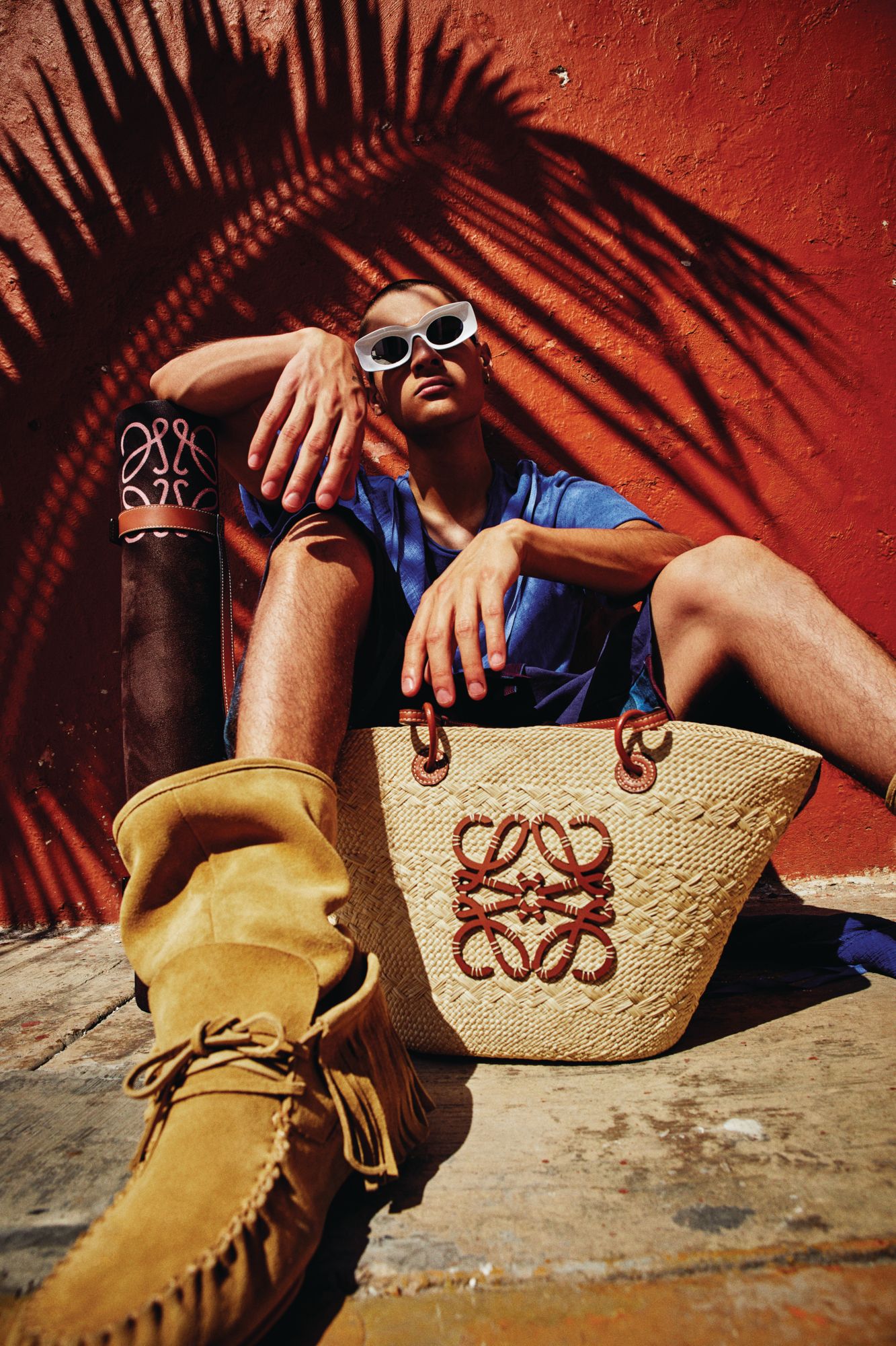 Join The Tribe: Beating out the “mandals” or man-sandals, the rugged moccasin finds its way back to being the hottest shoe of season. Loewe Paula’s Ibiza outfit.