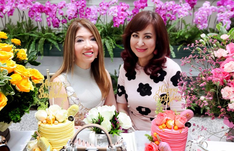 Birthday girls Lee Jim Leng and Vivienne Cheng