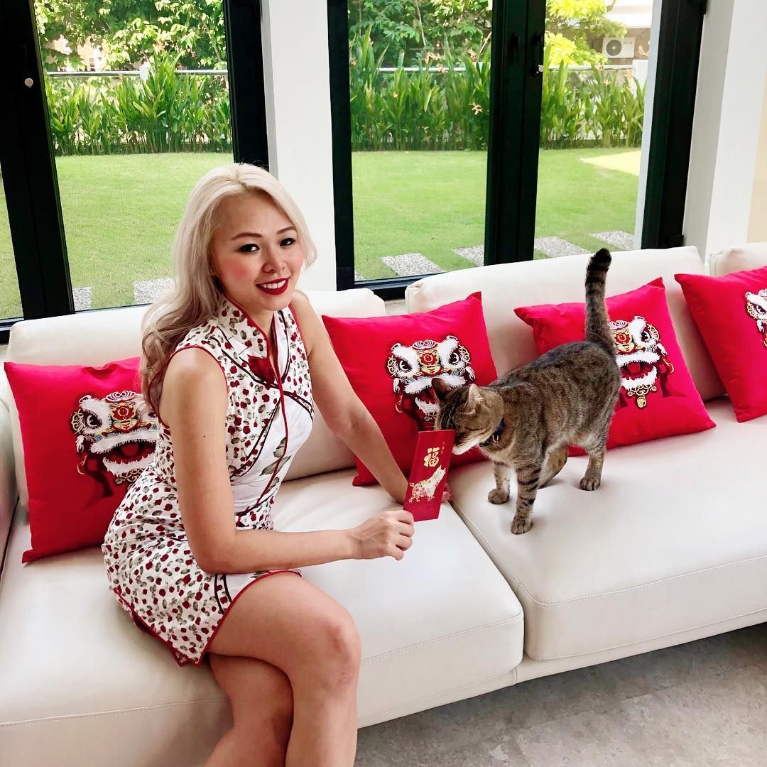 Lyn Siew gears up for the first day of Chinese New Year under the watchful eye of a furry friend. (Photo: @slamducky/Instagram)