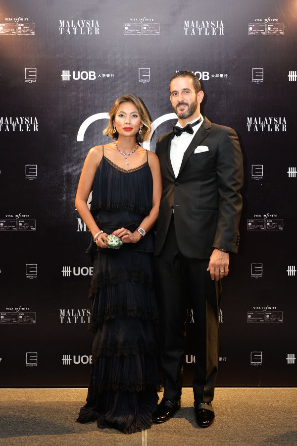 2018 October: It may look like her most understated red carpet look, but look closer and you'll see how she revolutionises the black dress with a tiered frills skirt. at the Tatler Ball