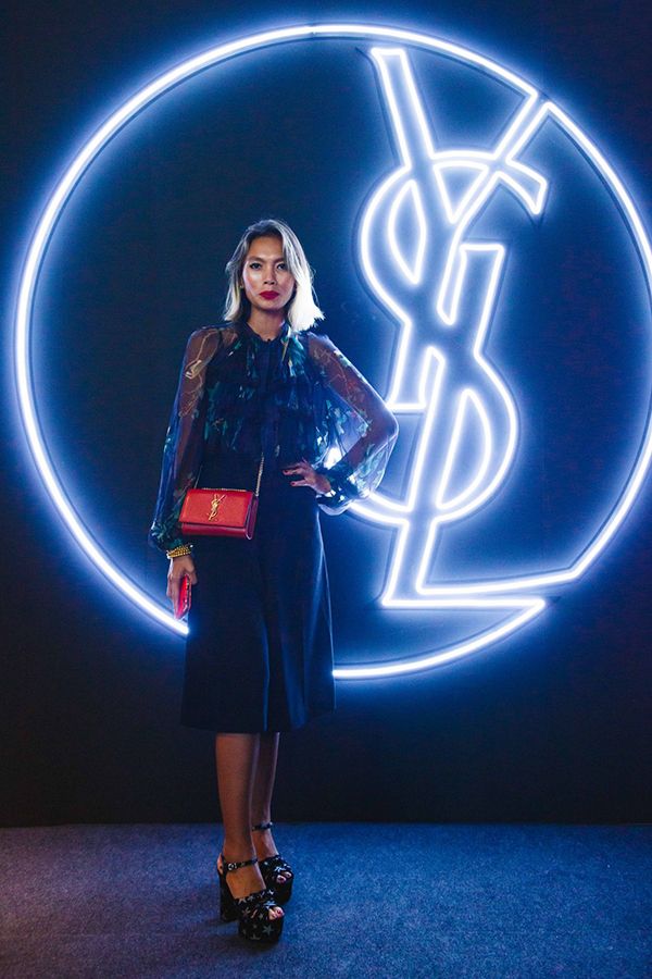 2018 September: The fashion chameleon debuts a blonde bob, dressed in a sheer black outfit at the YSL Beauty Hotel official opening