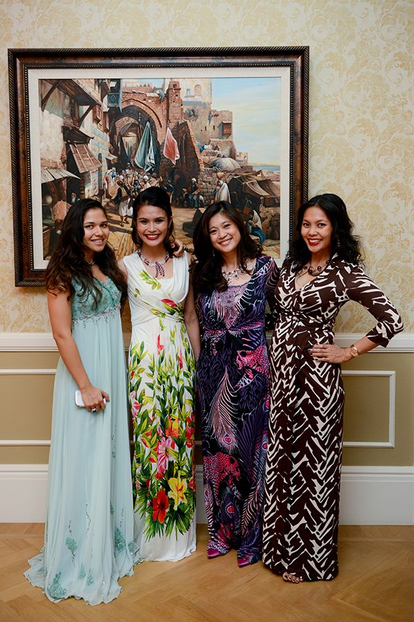 2014 June: Esha (far right) dons a striking striped dress at the birthday party of Toh Puan Habibah Yusof with Amira Geneid, Aishah Geneid and Mariam Teh