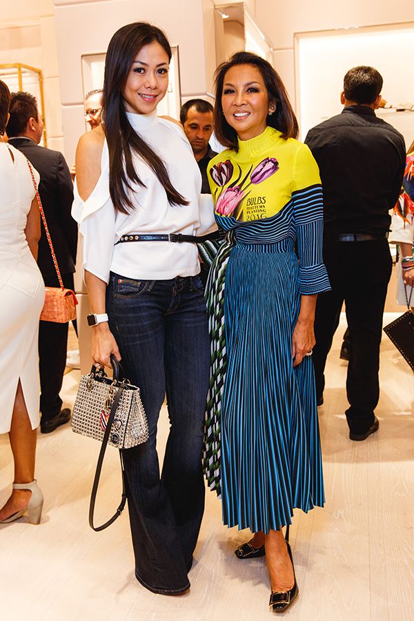 2016 February, grand opening of Roger Vivier: One of her more casual but effortless pairings of cold-shoulder blouse and kick flare jeans, the fashion maven rubbing shoulders with Dato' Sri Farah Khan