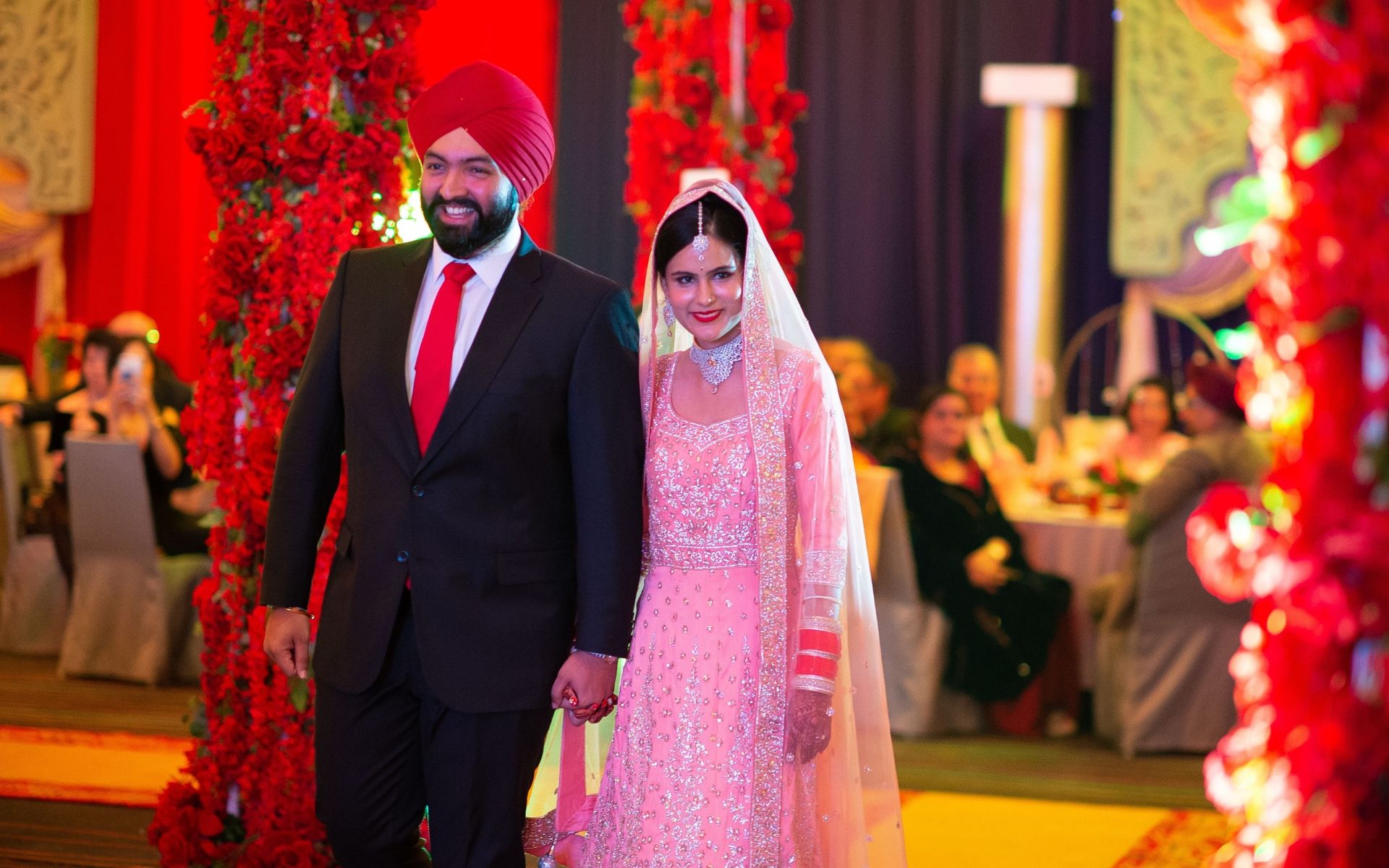 The bride and groom, Dato' Sukhjit Singh Gill and Datin Simerjit Kaur, making their entrance