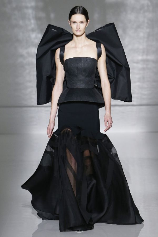 The large bow on the back of dresses is a recurring accessory that's an avant garde twist to femininity (Photo credit: Givenchy)