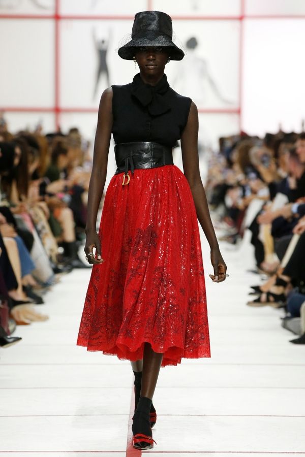 Dior assembles a sleek sleeveless top with a fun tropical sequined skirt (Photo credit: Dior)