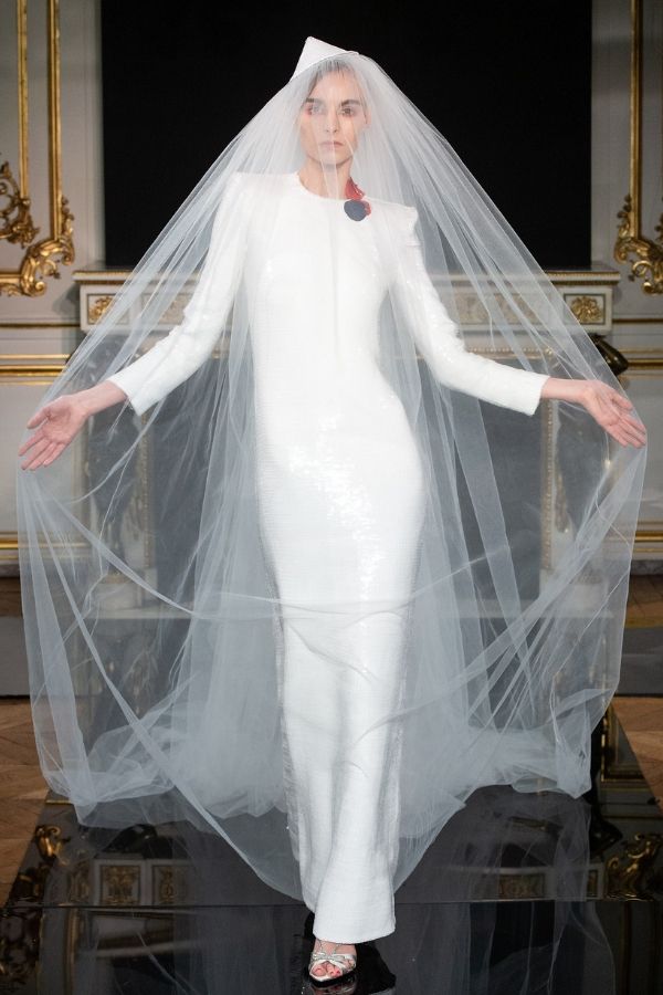 A sleek wedding dress with a haunting veil is a key look from the show (Photo credit: Giorgio Armani)