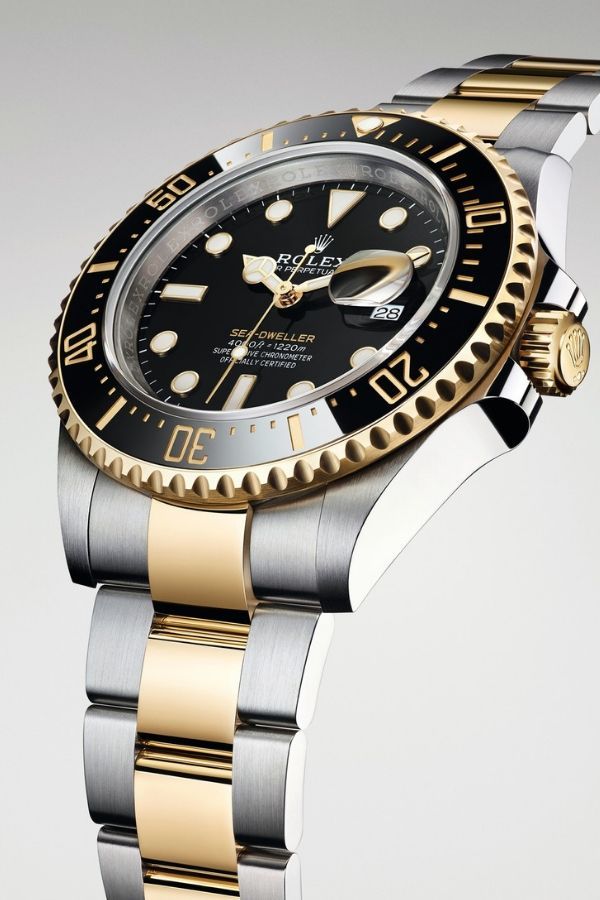 Showcase your adoration for dad that's as deep as the ocean with the Sea Dweller watch in yellow gold by Rolex. (Photo credit: Rolex)
