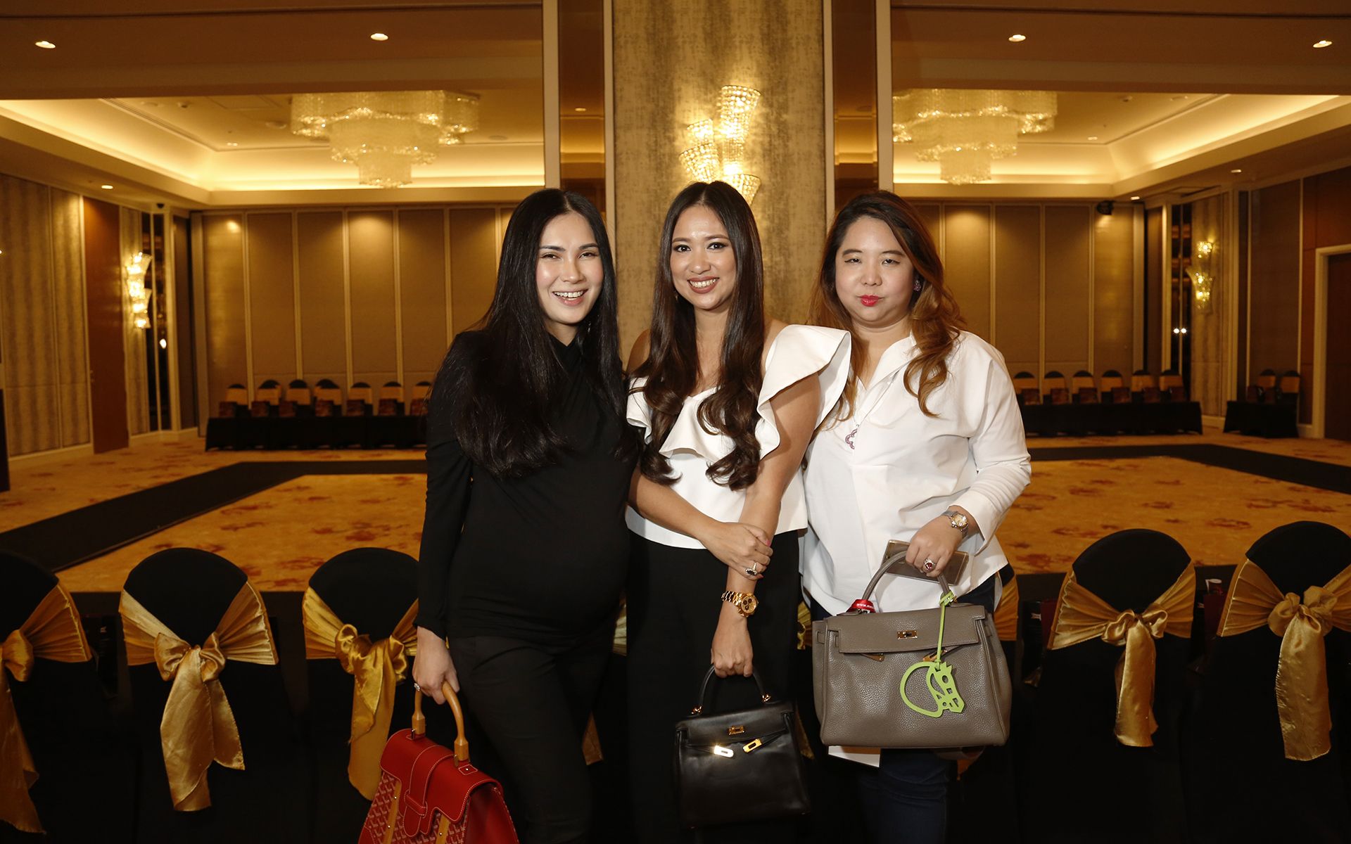 2017, September: Datin Yvette displays a penchant for white at the moment, complementing her ensemble at Jewellery Asia 2017 with a white blouse with collar detailing, accentuating her jet-black wavy hair