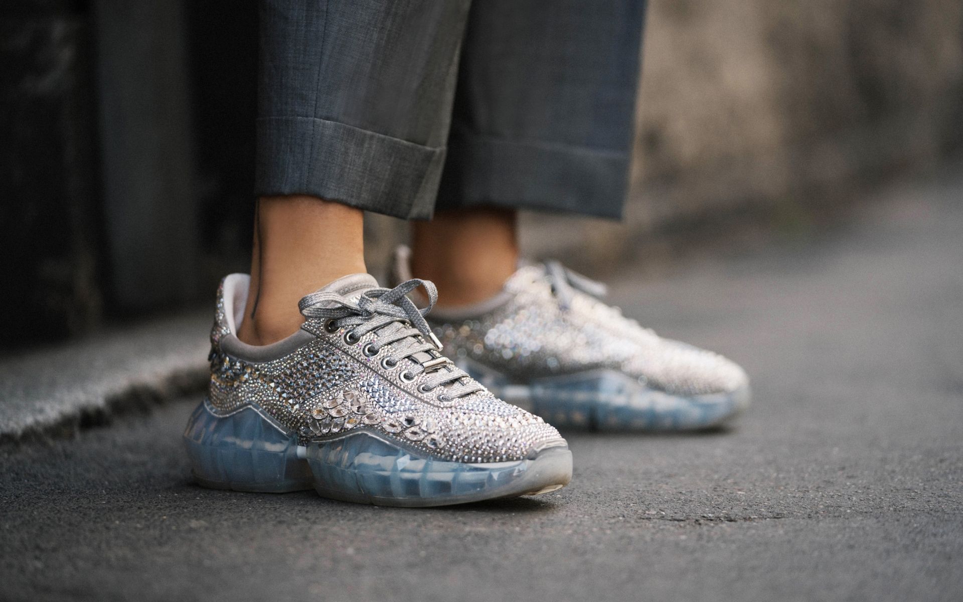 Snapped on the streets of Milan during fashion week, these unusual Jimmy Choo embellished sneakers immediately caught our attention. (Photo credit: Jimmy Choo)