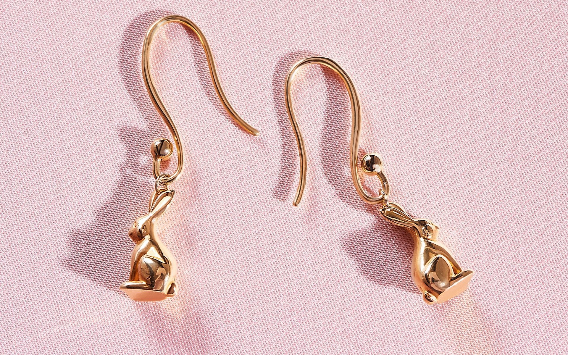 Have you a soft spot for animals? We love a pair of statement earrings in the form of slender gold rabbits. (Photo credit: Prada)